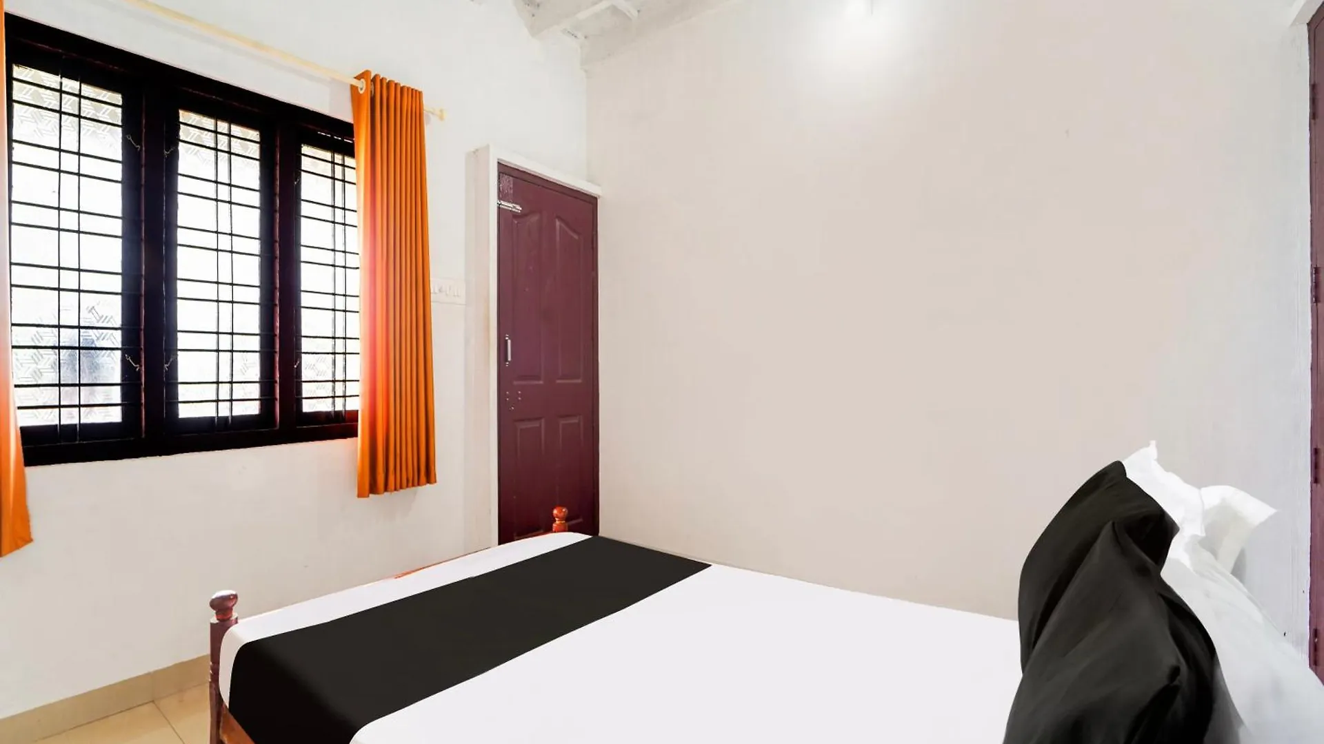Hotel O Sree Badra Lodge Thekkumkara
